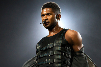 Usher Kicks Fan off Stage After Awkward Reaction To Seductive Bed Moves at Nashville Concert