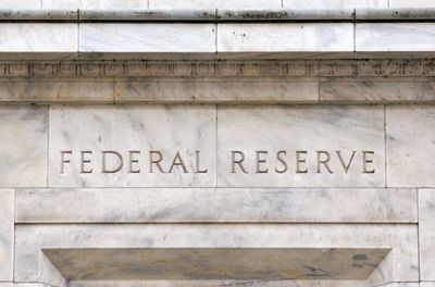 Fed keeps interest rates unchanged, citing ongoing inflation concerns