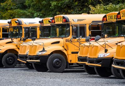 US schools are struggling to keep the yellow bus running amid shortages and cuts