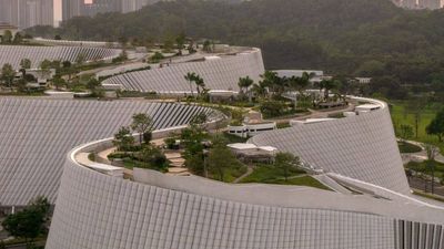 Inside China's new $517 million natural history museum that takes visitors from the cosmos to human evolution, featuring meteorites, dinosaurs and a river-inspired design