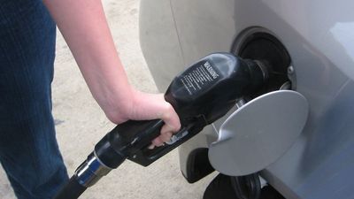 Atlanta mother was pumping gas at midnight when a man allegedly tried to grab her son. Her quick response stopped him