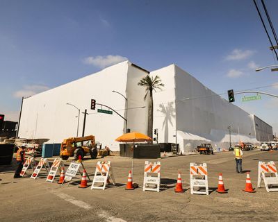 ‘Slap in the face’: LA mayor decries bid to rebuild burnt-out warehouse before cleanup is done