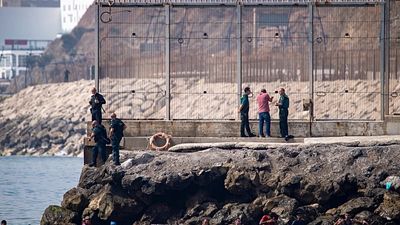 Spain mobilises troops to Ceuta as thousands of migrants continue to swim across the border from Morocco