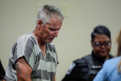 Dad who gifted teen son the gun he used to kill four in mass shooting gets 15 years