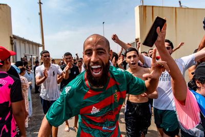 'Declare national emergency': Videos of Moroccan migrants entering Spain after swimming around border barriers go viral
