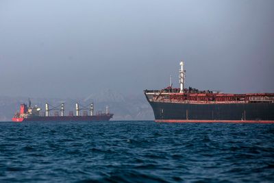 Trump let ships sit in the Strait of Hormuz for months. They now might be ‘superspreaders’