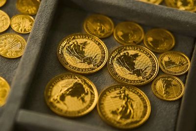 Gold on track to end four-month slump as investors weigh Fed signals