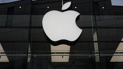 Apple shares fall despite record revenue as outlook disappoints