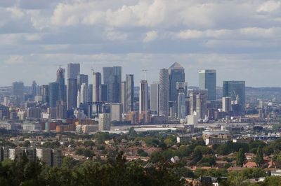 FTSE 100 closes just below milestone after strong week