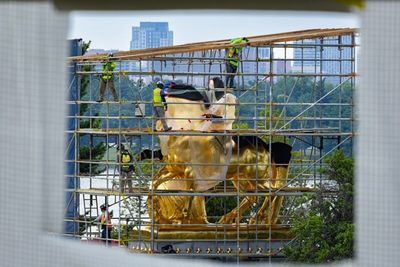 Trump team deceptively edits reaction to his $5M gilded statues in DC