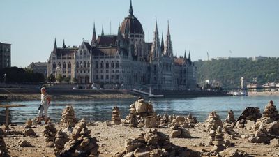 Lost income, energy fears and a woolly mammoth: what Europe’s dried-up rivers have yielded