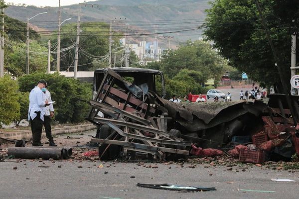 Truck explodes outside Colombia police base, injuring 11 officers and killing a dog