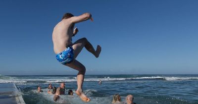 Cool cops brave chilly dip in Merewether baths to support special cause