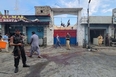 A suicide bomber strikes an anti-militant rally in northwestern Pakistan, killing at least 14