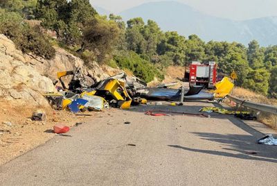 Two helicopters collide outside Athens as Greece battles to control wildfires