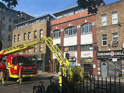 Flats evacuated as fire breaks out at shop in east London