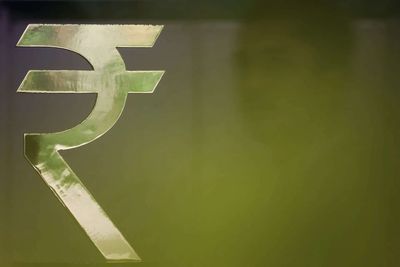 Indian rupee ends flat as robust importer hedging blunts oil price relief