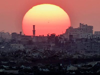 After deadly day, Gazans say Trump's touting of plan jars with grim reality