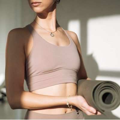 I Tried Red Light Pilates to Boost Recovery, Wellbeing and Longevity—Here's What Actually Happened