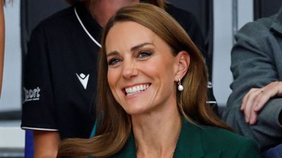 Kate Middleton nails summer-to-autumn styling with forest green blazer, striped vest and pleated skirt - it's chic and simple