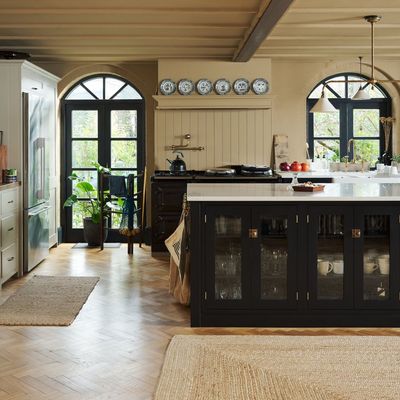This showstopping kitchen was once an old swimming pool – 6 design tricks that turned the vast space into the cosy heart of the home