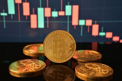 Bitcoin, Dogecoin Gain; Ethereum, XRP Slide Amid Trump's Latest Warning to Iran: Analyst Says BTC 'Bottom' Not Yet Confirmed
