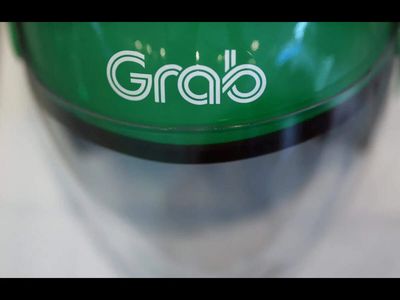 Singapore's Grab lifts annual forecasts as AI, incentives drive growth