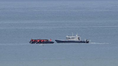 More than 150 migrants rescued after boat catches fire during Channel crossing