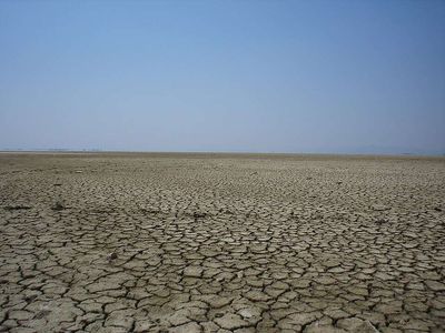 Kyrgyzstan's 2021 water crisis inspired a plan using helicopters to spray coal dust on mountain snow to release water for drought-stricken farms