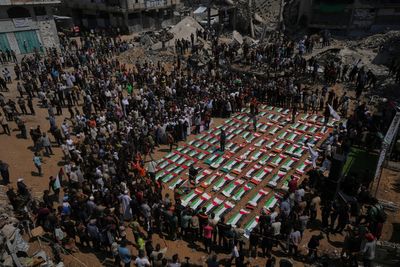 Palestinians hold mass funeral for 112 bodies finally recovered from a 2023 Gaza strike