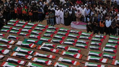 Gaza mass funeral for 112 Palestinians, including dozens of children, recovered from 2023 strike