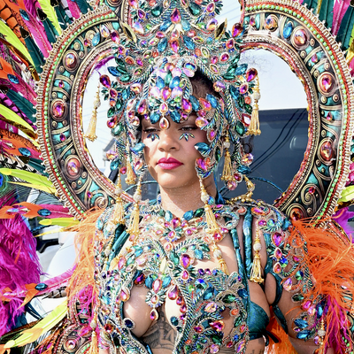 Rihanna Styled an Elaborate Jeweled Carnival Bodysuit With Summer's Favorite Mesh Shoe Trend