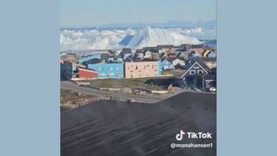 A livestream from Greenland’s UNESCO-listed Ilulissat Icefjord captured a mammoth iceberg rolling over and exposing its blue underside