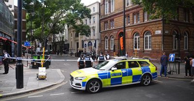 Woman arrested after four people stabbed in central London