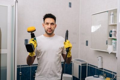 Before You Grab the Caulk Gun, Avoid These Bathroom DIY Mistakes