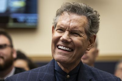 Cancer Care Goes Beyond Medicine as Randy Travis Helps Lift a Patient's Spirits