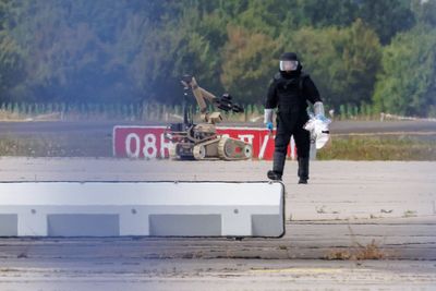 German minister says explosive-laden drone found at airport reflects a ‘new threat’