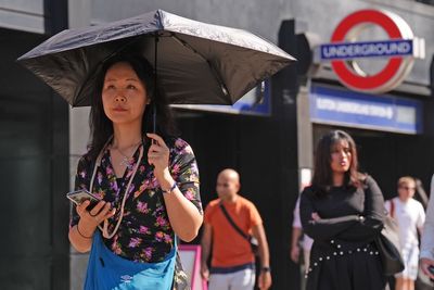 July heatwave keeps shoppers at home in blow for high street