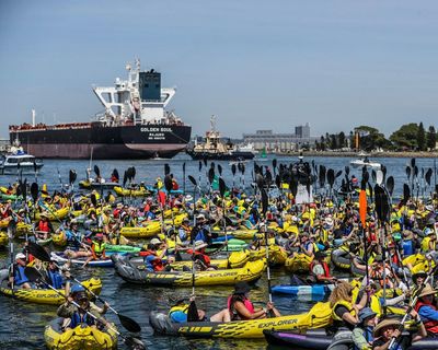 Police drop charges against 125 Rising Tide protesters two years after Newcastle port blockade