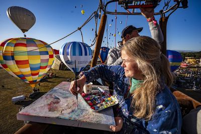 British artist takes to the skies to paint from hot air balloon basket