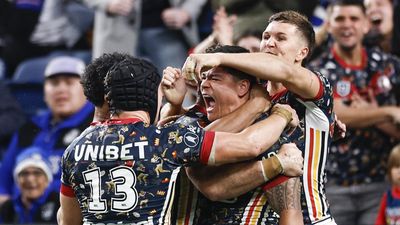 Roosters pip Dogs to go level with Penrith at top