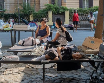 Scramble to house hundreds camping in Rome heatwave after squat eviction