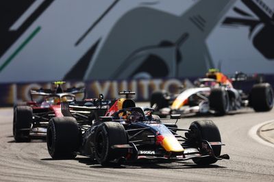 F1 helmet signed by 20 drivers raises record six-figure sum for charity