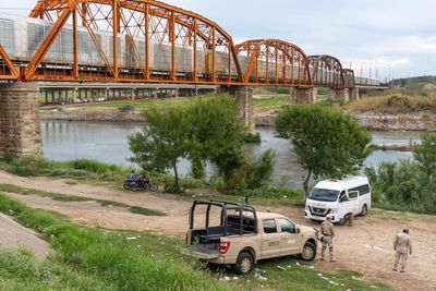 US police officer accused of killing three people in Mexico arrested at border