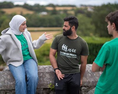 Planting seeds of peace: teenagers from conflict-torn world build bridges at summer camp