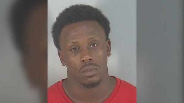Florida man allegedly hits accelerator when officer opens door, trapping her between him and the steering wheel