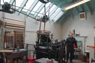 Victorian printing press working once more after major restoration
