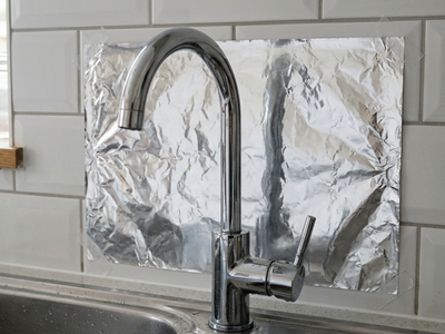 Stick aluminium foil behind tap: Why many people do it and how to use it correctly