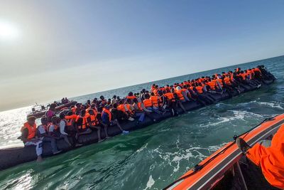 Record 230 migrants cross Channel in single ‘mega-dinghy’