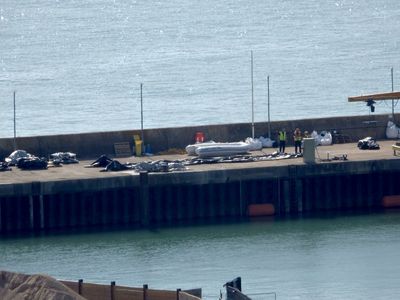 'Mega dinghy' carrying record 230 migrants arrives in UK from France
